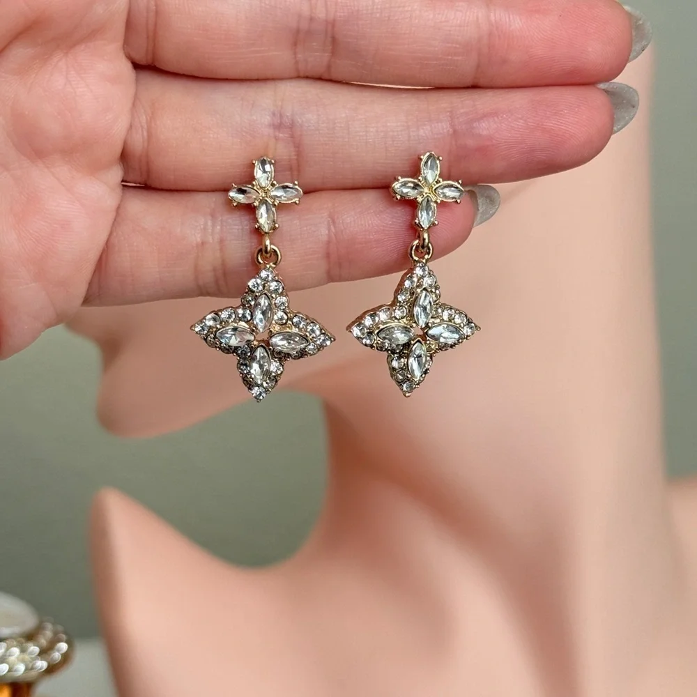 Elegant Gold and Silver Cross Earrings - Picture 6 of 8